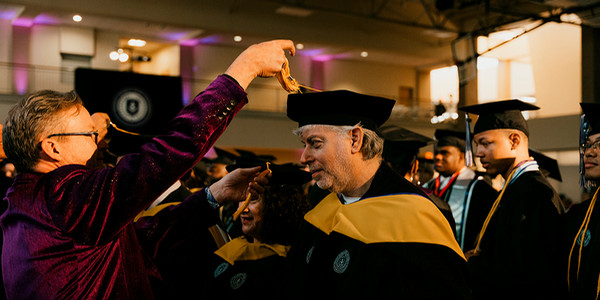 mga alum turning tassel on grads cap